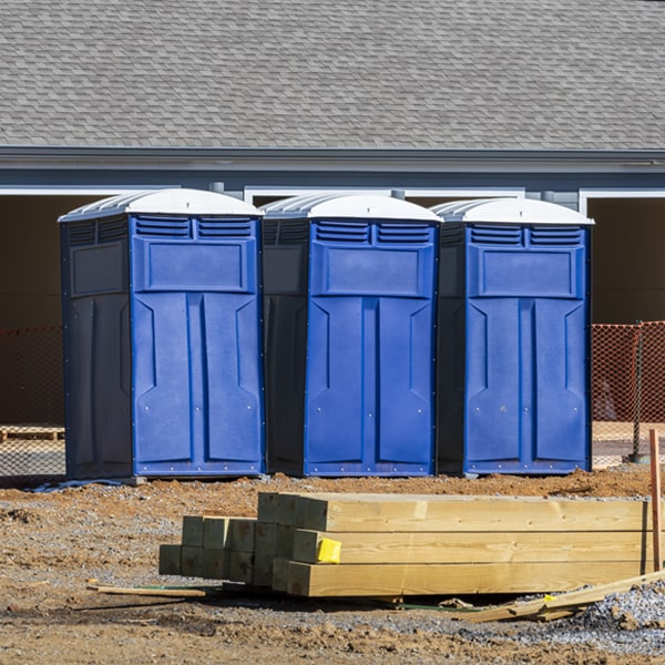 are there any additional fees associated with portable restroom delivery and pickup in Rockingham